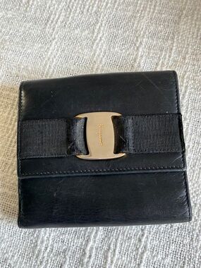 Salvatore Ferragamo Black Leather Wallet with Gold Bow Accent